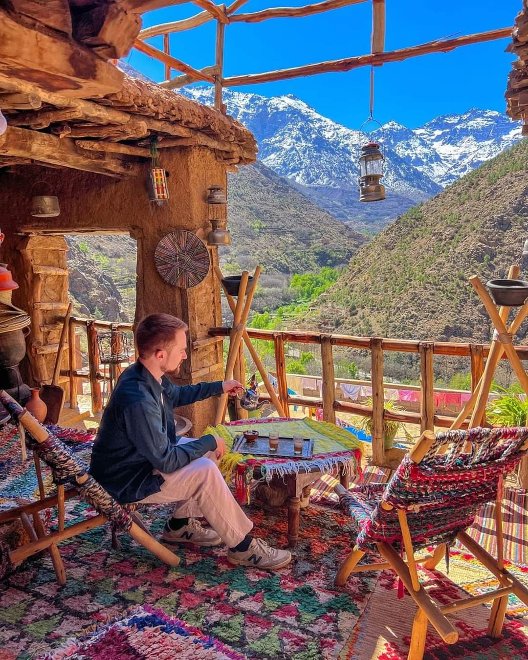 Sitting on the roof of a Berber house in the Atlas Mountains mountain Morocco...It symbolize the aspect of hospitality in Berber culture