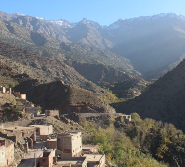 Solo Trekking in Morocco 2 Trekker on a rocky trail in the High Atlas Mountains near Imlil, Morocco